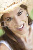 Outdoor Portrait of Beautiful Young Woman In Straw Cowboy Hat