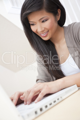 Beautiful Asian Chinese Woman Using Laptop Computer