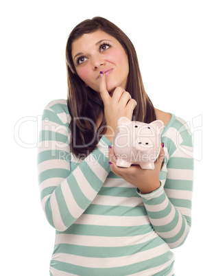 Ethnic Female Daydreaming and Holding Piggy Bank on White
