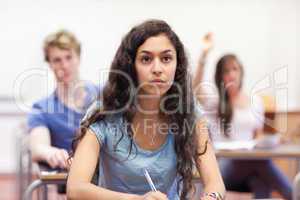 Student listening to her teacher