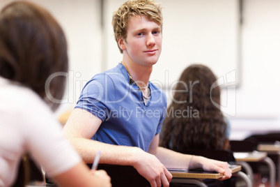 Student sitting at a table