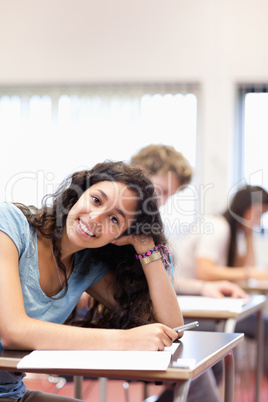 Portrait of a smiling young student posing