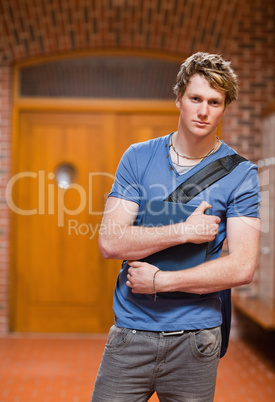 Portrait of a handsome student with a book