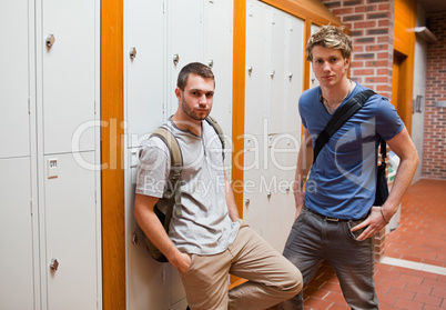 Handsome students standing up