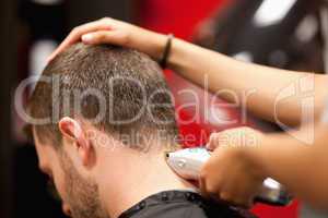 Close up of a male student having a haircut