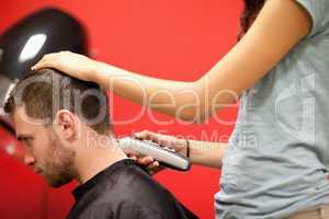 Male student having a haircut