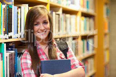 Smiling female student posing