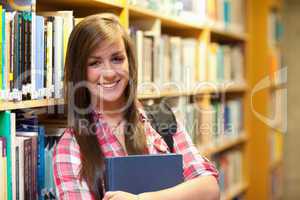 Smiling female student posing