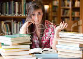 Disappointed student having a lot to read