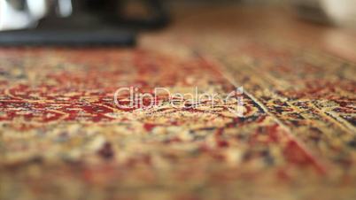 Vacuuming Colorful Carpet-Low Angle