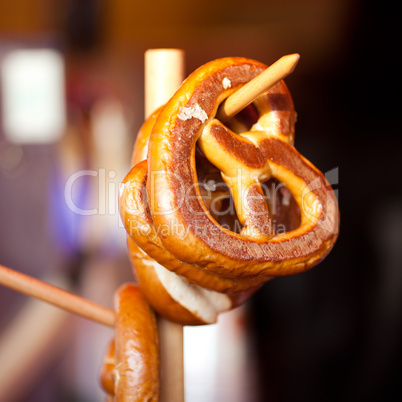 pretzel hanging on a branch