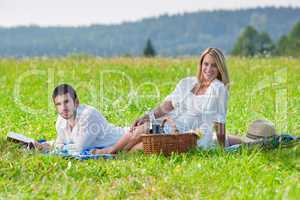 Picnic - Romantic couple read book meadows