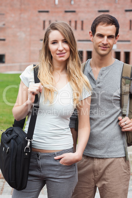 Portrait of a cute student couple posing