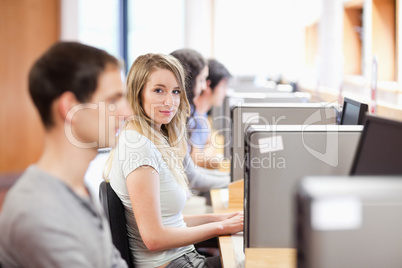 Fellow students using a computer