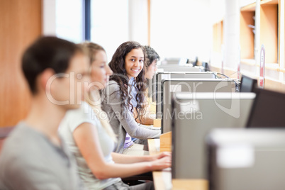 Fellow students in an IT room