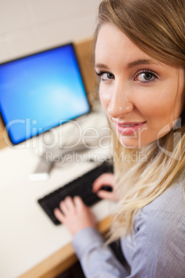Young businesswoman using a computer