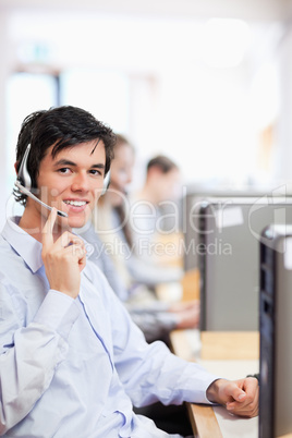 Portrait of an operator posing with a headset