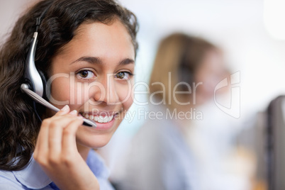 Close up of a smiling customer assistant