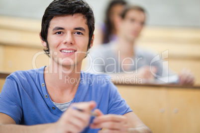 Student listening to a lecturer