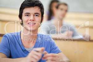 Student listening to a lecturer