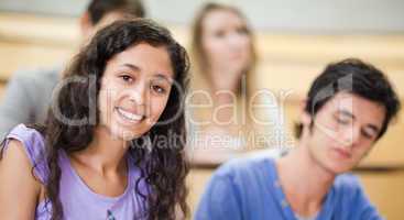 Smiling student in a amphitheater