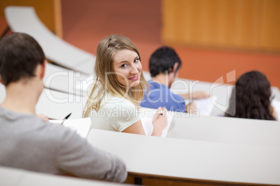 Young student being distracted