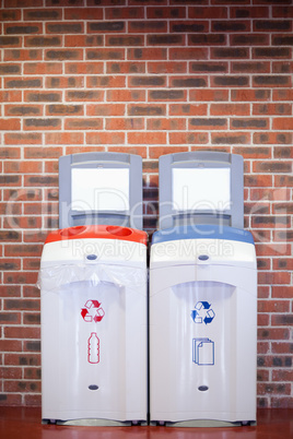 Portrait of recycling bins