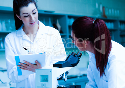 Lab partners discussing about their results