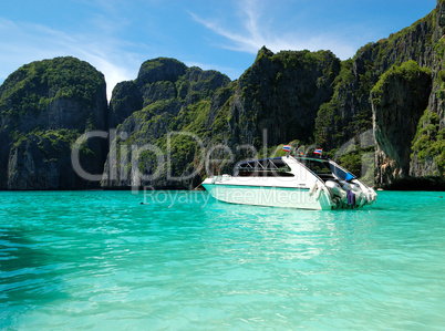 Motor boat on turquoise water of Indian Ocean, Phi Phi island, T