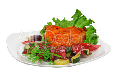 Fried chicken on a plate with vegetables