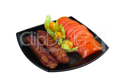 Kebab with vegetable garnish