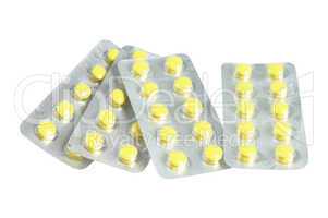 Several packs of yellow pills