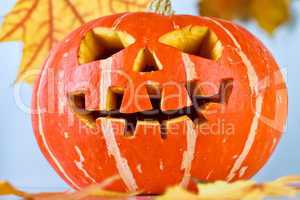 halloween, old jack-o-lantern on blue