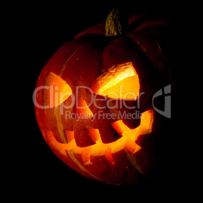 halloween, old jack-o-lantern on black