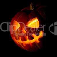halloween, old jack-o-lantern on black