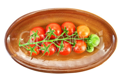 Red tomatoes on a plate