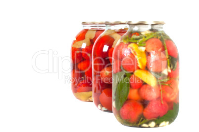 red tomatoes in a glass jar