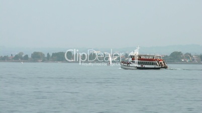 Ship and tourists on Lake Garda