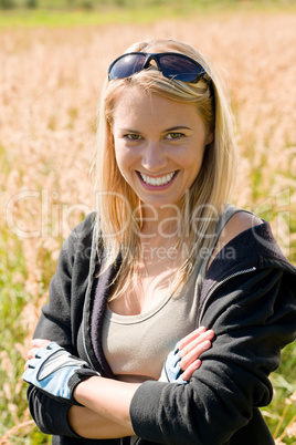 Sportive young woman portrait sunny outdoor