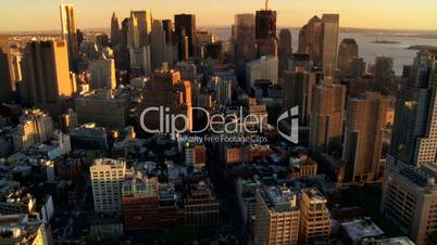 Aerial view of the Setting Sun over Manhattan and Iconic Skyscrapers, NY, USA