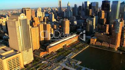 Aerial view of the Setting Sun over Manhattan and Iconic Skyscrapers, NY, USA