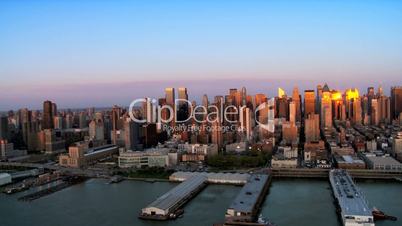 Sunset over the Hudson River and Manhattan, Financial District, NY, USA
