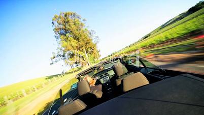 Luxury Car Driving Through Napa Valley