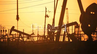 Fossil Fuel Production at Sunset