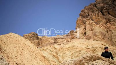 Female Trekking Achievement in Desert Canyons