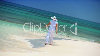 Female in White on a Tropical Beach
