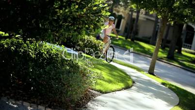 Senior Couple Exercising Outdoors on Bicycles