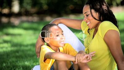 African American Mother & Son Outdoors Together