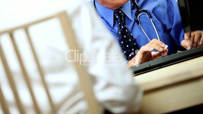 Mature Medical Consultant Meeting with Patient