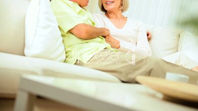 Senior Couple Enjoying Retirement Relaxing at Home